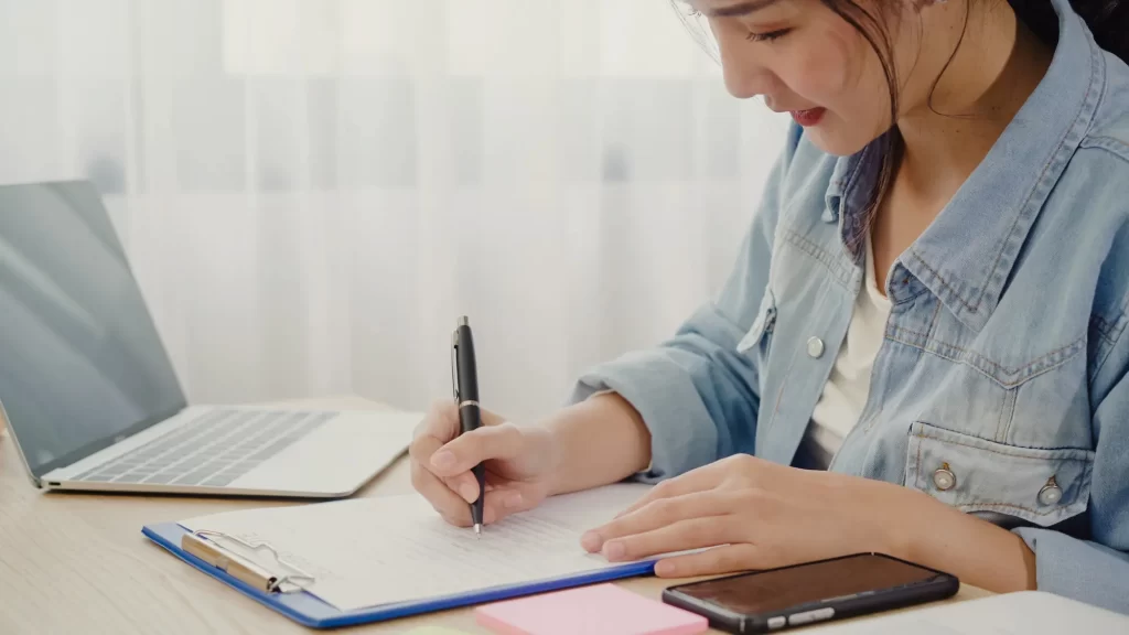 a young girl taking Japanese Language Proficiency Test